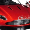 Aston Martin DB11 Copper Orange 1/24 Diecast Model Car Motormax 79345