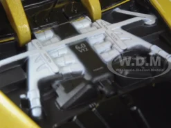 Aston Martin Vantage S V12 Yellow 1/24 Diecast Model Car Motormax 79322