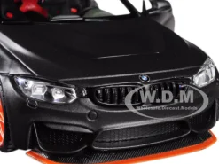 BMW M4 GTS Gray Carbon Top Orange Wheels 1/24 Diecast Model Car Maisto 31246
