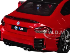 2024 BMW M2 Performance Parts Toronto Red Metallic with Carbon Top 1/18 Diecast Model Car by Solido