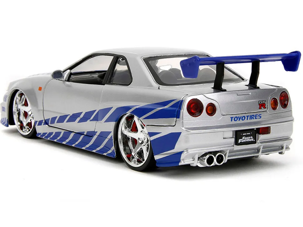Brian's Nissan Skyline GT-R (R34) Silver Metallic with Blue Stripes and Suki's Honda S2000 Pink with Graphics Set of 2 Cars "Fast & Furious 25th Anniversary" "Fast & Furious" Series 1/24 Diecast Model Cars by Jada