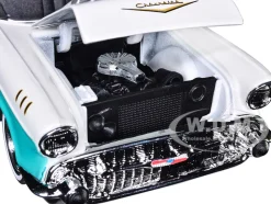 1957 Chevrolet Bel Air Lowrider Turquoise Metallic White Get Low Series 1/24 Diecast Model Car Motormax 79029