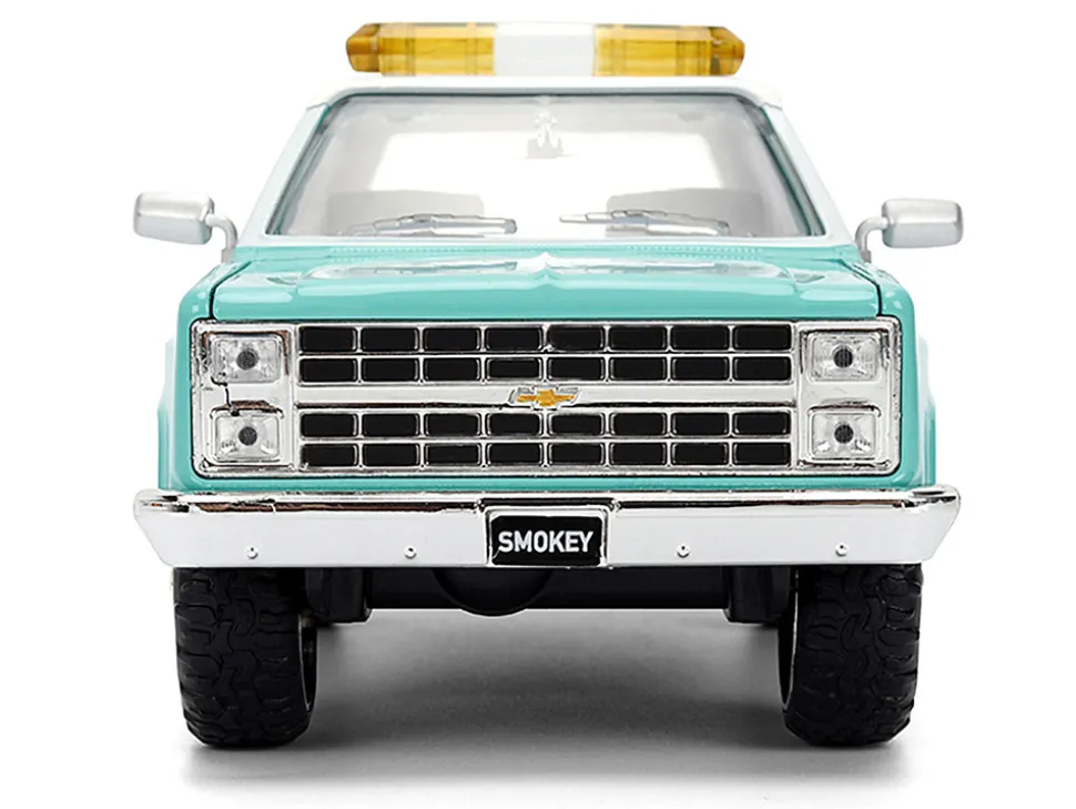 1980 Chevrolet Blazer Light Green with White Top and Graphics and Smokey Bear Diecast Figure "Smokey Bear" "Hollywood Rides" Series 1/24 Diecast Model by Jada