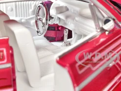 1964 Chevrolet Impala SS Lowrider Pink with Graphics and White Interior 
