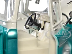 1957 Chevrolet 3100 Stepside Pickup Truck Lowrider Turquoise Metallic and White with White Interior Get Low Series 1/24 Diecast Model Car Motormax 79032tur
