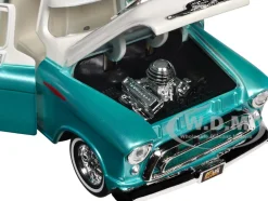 1957 Chevrolet 3100 Stepside Pickup Truck Lowrider Turquoise Metallic and White with White Interior Get Low Series 1/24 Diecast Model Car Motormax 79032tur