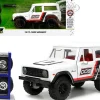 1973 Ford Bronco #008 White with Red and Black Stripes and Red Interior with Extra Wheels Just Trucks Series 1/24 Diecast Model Car Jada 34181