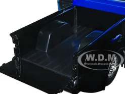 1956 Ford F 100 Pickup Truck Black and Blue Metallic with Ford Graphics Just Trucks Series 1/24 Diecast Model Car Jada 34307