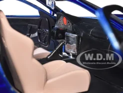 1993 Mazda RX-7 Candy Blue Metallic with Graphics and Chun-Li Diecast Figure Street Fighter Video Game Anime Hollywood Rides Series 1/24 Diecast Model Car Jada 30838