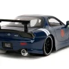 1993 Mazda RX 7 Dark Blue with Green Hood and Kakashi Hatake Diecast Figure Naruto Shippuden 2009 2017 TV Series Anime Hollywood Rides Series 1/24 Diecast Model Car Jada 34370