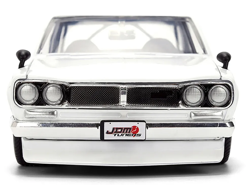 1971 Nissan Skyline 2000GT-R RHD (Right Hand Drive) White with Gold Graphics "JDM Tuners" Series 1/24 Diecast Model Car by Jada