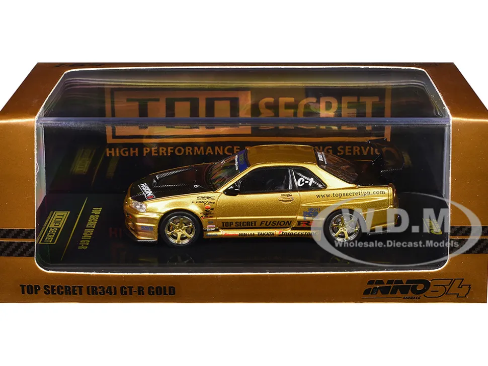 Nissan Skyline GT-R (R34) RHD (Right Hand Drive) "Top Secret" Gold Metallic with Carbon Hood and Trunk 1/64 Diecast Model Car by Inno Models