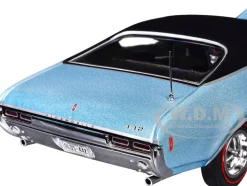 1968 Oldsmobile 442 W30 Holiday Coupe Teal Frost Metallic with Red Stripes and Black Vinyl Top 