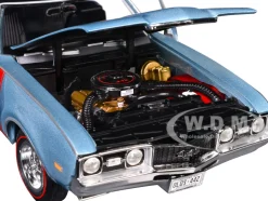 1968 Oldsmobile 442 W30 Holiday Coupe Teal Frost Metallic with Red Stripes and Black Vinyl Top 