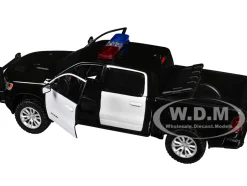 2019 RAM 1500 Laramie Crew Cab Pickup Truck Black and White with Flashing Light Bar and Front and Rear Lights and Sounds 1/27 Diecast Model Car by Motormax