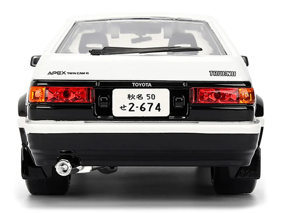 Toyota Trueno (AE86) RHD (Right Hand Drive) White and Black with Graphics and Takumi Diecast Figure "Initial D" (1998-2021) TV Series "Anime Hollywood Rides" Series 1/24 Diecast Model by Jada