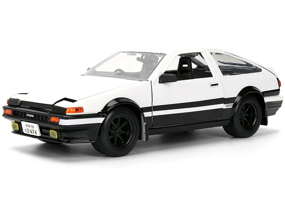 Toyota Trueno (AE86) RHD (Right Hand Drive) White and Black with Graphics and Takumi Diecast Figure "Initial D" (1998-2021) TV Series "Anime Hollywood Rides" Series 1/24 Diecast Model by Jada
