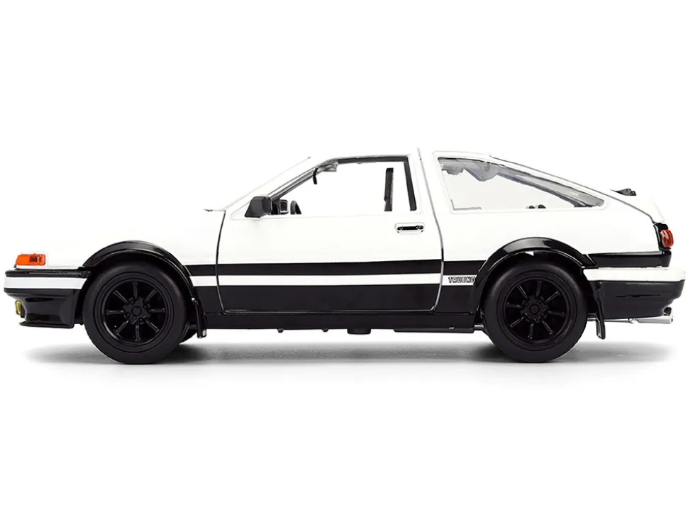 Toyota Trueno (AE86) RHD (Right Hand Drive) White and Black with Graphics and Takumi Diecast Figure "Initial D" (1998-2021) TV Series "Anime Hollywood Rides" Series 1/24 Diecast Model by Jada