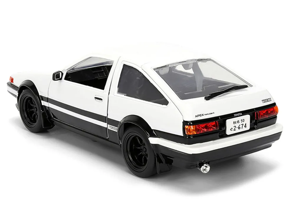 Toyota Trueno (AE86) RHD (Right Hand Drive) White and Black with Graphics and Takumi Diecast Figure "Initial D" (1998-2021) TV Series "Anime Hollywood Rides" Series 1/24 Diecast Model by Jada